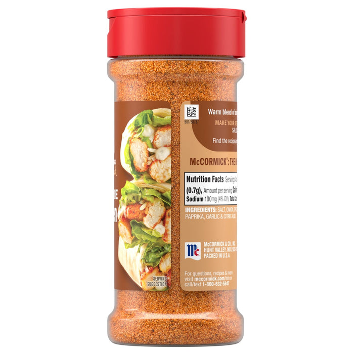 The back of a bottle of Mccormick Perfect Pinch Rotisserie Chicken Seasoning Powder 5 Oz, showing the nutrition facts and a serving suggestion of a chicken wrap.