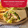 A close up of a crispy chicken caesar wrap and french fries seasoned with Mccormick Perfect Pinch Rotisserie Chicken Seasoning Powder 5 Oz to create a perfect lunch upgrade.