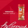 A bottle of Mccormick Perfect Pinch Cajun Seasoning Ground 5 Oz is displayed against a red background with the text Versatile Pantry Staple and the brand signature below.