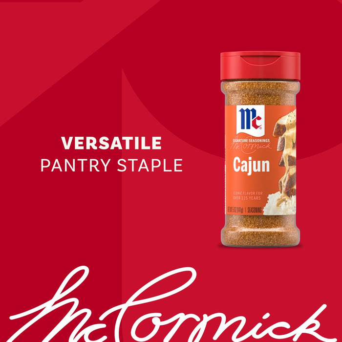 A bottle of Mccormick Perfect Pinch Cajun Seasoning Ground 5 Oz is displayed against a red background with the text Versatile Pantry Staple and the brand signature below.