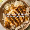 A bowl of sliced chicken breast and white rice seasoned with Mccormick Perfect Pinch Cajun Seasoning Ground 5 Oz and garnished with fresh herbs.
