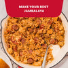 A large skillet filled with a hearty jambalaya made with rice, sausage, and chicken that has been seasoned with Mccormick Perfect Pinch Cajun Seasoning Ground 5 Oz.