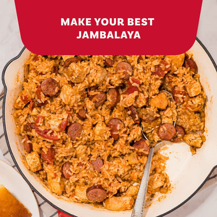 A large skillet filled with a hearty jambalaya made with rice, sausage, and chicken that has been seasoned with Mccormick Perfect Pinch Cajun Seasoning Ground 5 Oz.