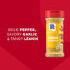 A bottle of Mccormick Signature Seasoning Lemon Pepper Oz is displayed against a red background with text highlighting its bold pepper, savory garlic, and tangy lemon flavors.