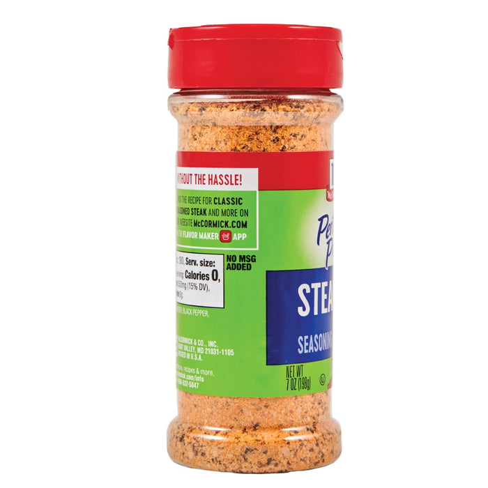['A McCormick Perfect Pepper Steak Seasoning bottle with a red lid.']