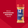 A bottle of Mccormick Perfect Pinch Steak Seasoning Ground 7 Oz is displayed against a red background with text highlighting its bold steakhouse-inspired taste.
