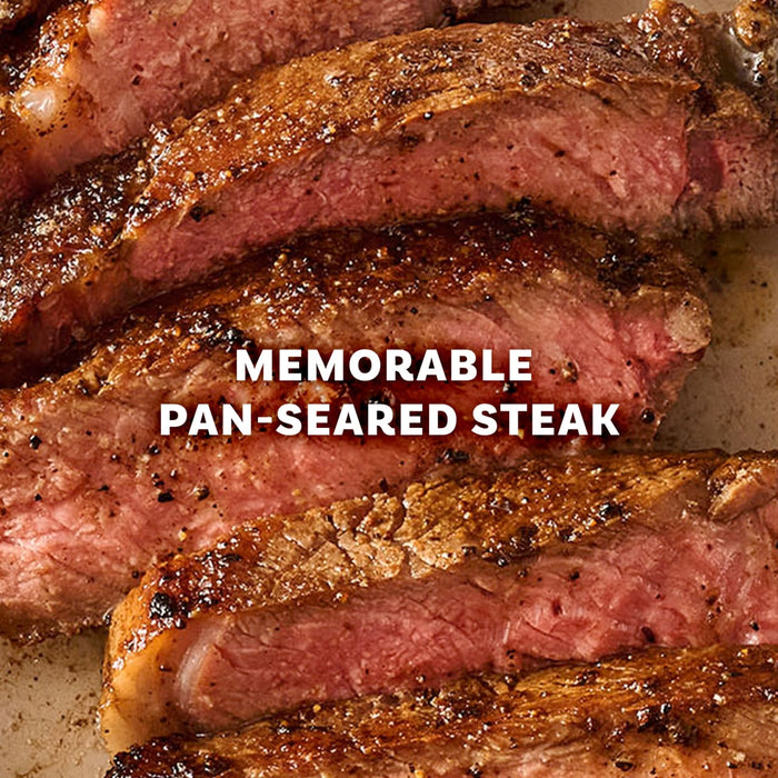Slices of juicy medium-rare beef are seasoned to perfection with Mccormick Perfect Pinch Steak Seasoning Ground 7 Oz to create a memorable pan-seared steak.