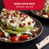 A crisp iceberg wedge salad topped with creamy dressing, bacon bits, blue cheese crumbles, and red onions is perfectly seasoned with Mccormick Perfect Pinch Steak Seasoning Ground 7 Oz.