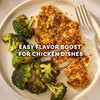 A plate of crispy breaded chicken and roasted broccoli florets seasoned with Mccormick Garlic And Herb Seasoning Ground 4.37 Oz for an easy flavor boost.