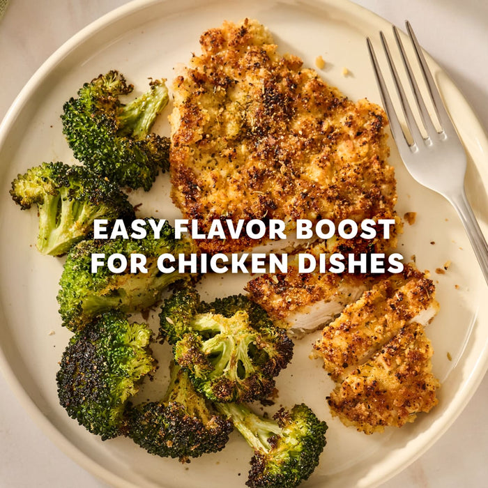 A plate of crispy breaded chicken and roasted broccoli florets seasoned with Mccormick Garlic And Herb Seasoning Ground 4.37 Oz for an easy flavor boost.
