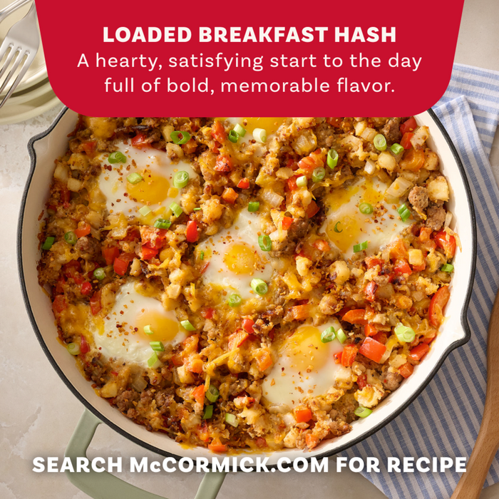 A hearty skillet of loaded breakfast hash featuring eggs and potatoes seasoned with Mccormick Roasted Garlic And Red Bell Pepper Seasoning Ground 4.34 Oz to create a satisfying start to the day.