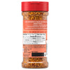 The back label of Mccormick Roasted Garlic And Red Bell Pepper Seasoning Ground 4.34 Oz displays nutrition facts and an ingredient list featuring garlic, red bell pepper, and chili pepper.