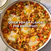 A hearty breakfast skillet filled with sausage, potatoes, and peppers is seasoned with Mccormick Roasted Garlic And Red Bell Pepper Seasoning Ground 4.34 Oz and topped with several fried eggs.