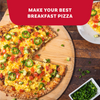 A vibrant breakfast pizza topped with scrambled eggs, bacon, tomatoes, avocado, and jalapenos is seasoned with Mccormick Roasted Garlic And Red Bell Pepper Seasoning Ground 4.34 Oz for a flavorful morning meal.