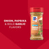 A bottle of Mccormick Onion And Herb Seasoning Crystal 4.16 Oz is displayed against a red background highlighting its onion, paprika, and bold garlic flavors.