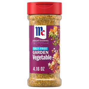 A clear plastic bottle of Mccormick Vegetable Seasoning Assorted Form 4.16 Oz featuring a purple label that highlights its salt free garden vegetable flavor profile.