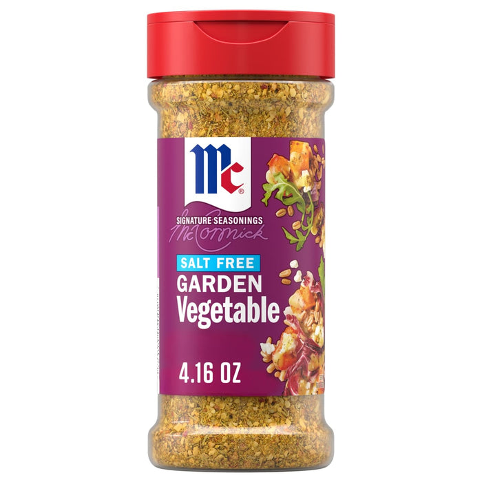 A clear plastic bottle of Mccormick Vegetable Seasoning Assorted Form 4.16 Oz featuring a purple label that highlights its salt free garden vegetable flavor profile.