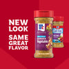 An advertisement featuring the new packaging for Mccormick Vegetable Seasoning Assorted Form 4.16 Oz alongside the previous bottle design to highlight the updated look with the same great flavor.