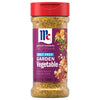 A clear bottle of Mccormick Vegetable Seasoning Assorted Form 4.16 Oz is shown, featuring a purple label with the text Salt Free Garden Vegetable and a red cap.
