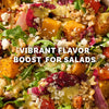 A close up view of a colorful grain salad featuring roasted squash and greens that would be enhanced by Mccormick Vegetable Seasoning Assorted Form 4.16 Oz.