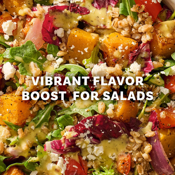 A close up view of a colorful grain salad featuring roasted squash and greens that would be enhanced by Mccormick Vegetable Seasoning Assorted Form 4.16 Oz.