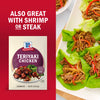 McCormick Teriyaki Chicken seasoning mix is shown with lettuce wraps filled with teriyaki chicken and vegetables.