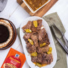 A serving of slow cooker roast with McCormick Slow Cooker Roast seasoning packet visible.