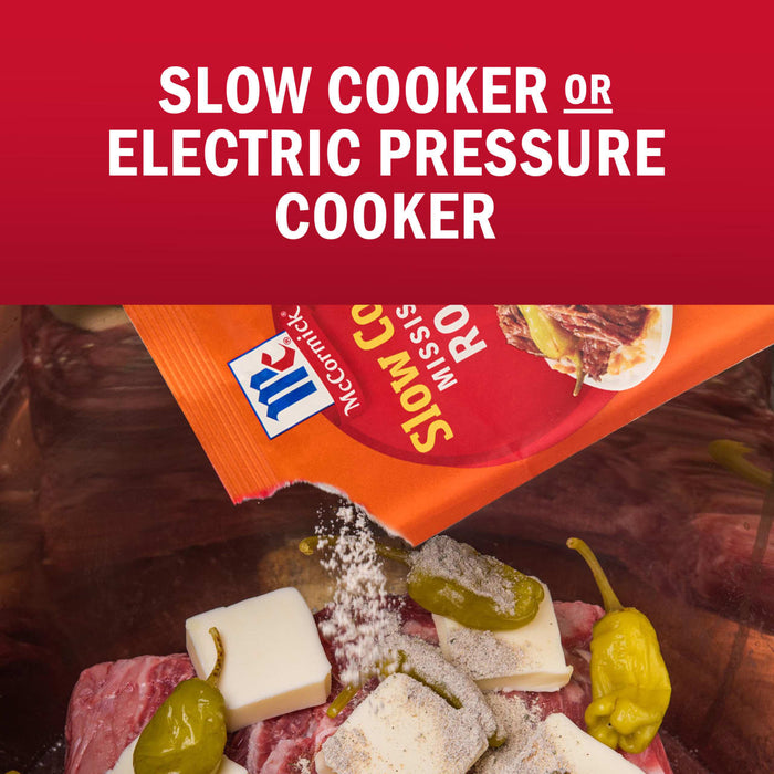McCormick Slow Cooker Roast recipe mix being poured over beef, butter, and peppers for a slow cooker or electric pressure cooker meal.