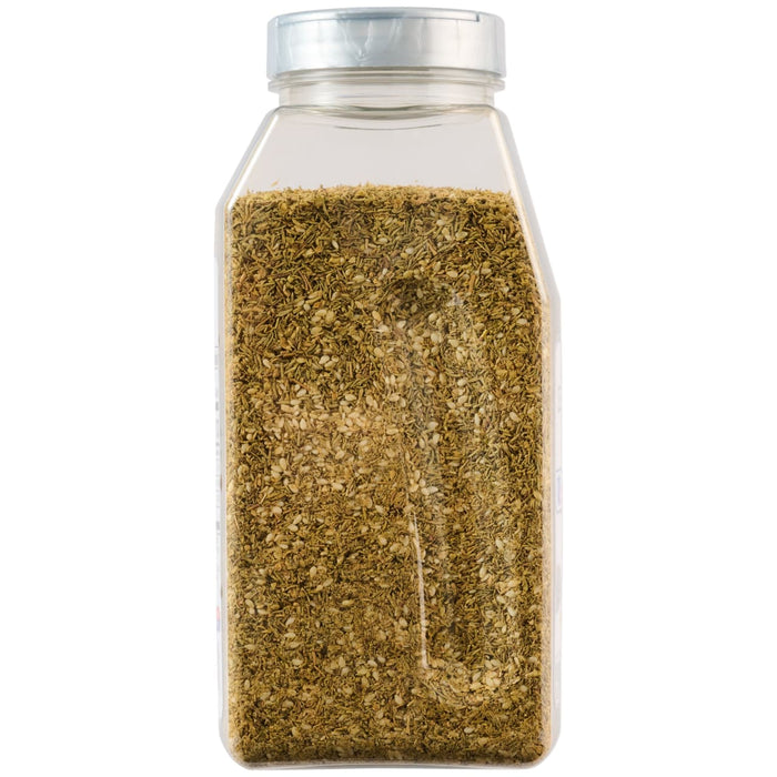 A clear, rectangular spice shaker is shown filled with Mccormick Culinary Zaatar Seasoning Assorted Form 12.5 Oz, a greenish-brown blend of dried herbs and sesame seeds, against a white background.