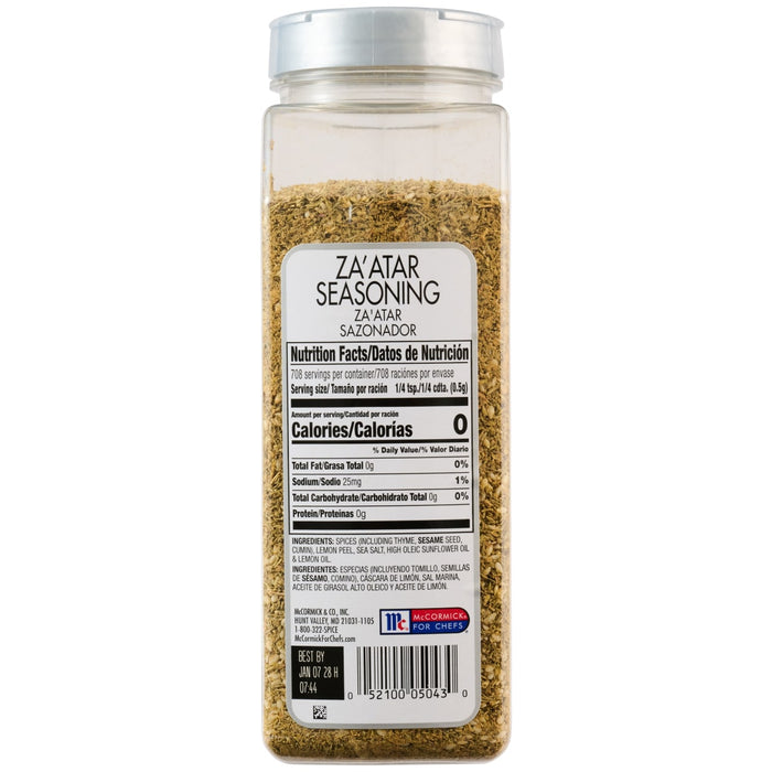 A clear plastic bottle of Mccormick Culinary Zaatar Seasoning Assorted Form 12.5 Oz, showing the back label with nutrition facts, ingredients like thyme and sesame seeds, and the McCormick for Chefs logo.