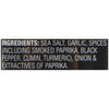 ['A black label with white text listing the ingredients for a seasoning blend.']
