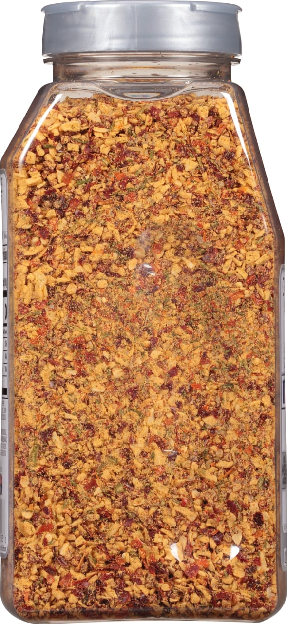 ['A close up of a jar of McCormick Grill Mates Montreal Steak Seasoning.']