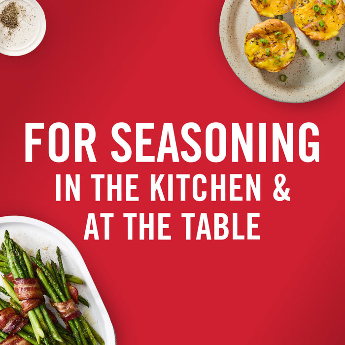 ['A red background with white text that reads FOR SEASONING IN THE KITCHEN &amp; AT THE TABLE with two plates of food on either side.']