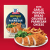 McCormick Air Fryer Garlic Parmesan seasoning mix is shown with a plate of air-fried chicken, fries, and broccoli.