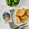 McCormick Air Fryer Parmesan seasoning mix is shown with cooked chicken and broccoli.