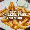 A plate of crispy crinkle-cut fries with a creamy dipping sauce, advertised as perfect for chicken, fries, and more.