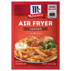 ['McCormick Air Fryer Loaded seasoning mix package with a serving suggestion of fried chicken, fries, and broccoli.']