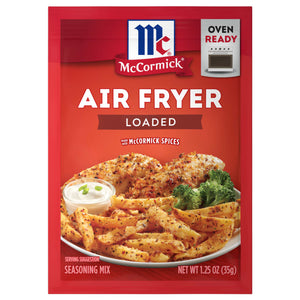 ['McCormick Air Fryer Loaded seasoning mix package with a serving suggestion of fried chicken, fries, and broccoli.']