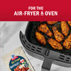 McCormick Air Fryer Buffalo Wings seasoning mix is shown with cooked chicken wings in an air fryer, highlighting its suitability for both air fryers and ovens.