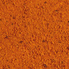 ['Close up of orange and red spices.']