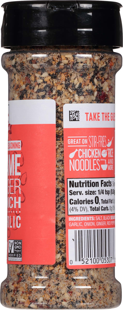 ['A bottle of Spice Islands Sesame Ginger Crunch Garlic seasoning.']
