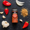McCormick's Nashville Hot Chicken seasoning is displayed with ingredients like peppers, garlic, and spices.