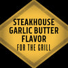 A yellow diamond-shaped sign with black text that reads Steakhouse Garlic Butter Flavor For The Grill.