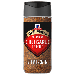 A bottle of McCormick Grill Mates Chili Garlic Tri-Tip seasoning.