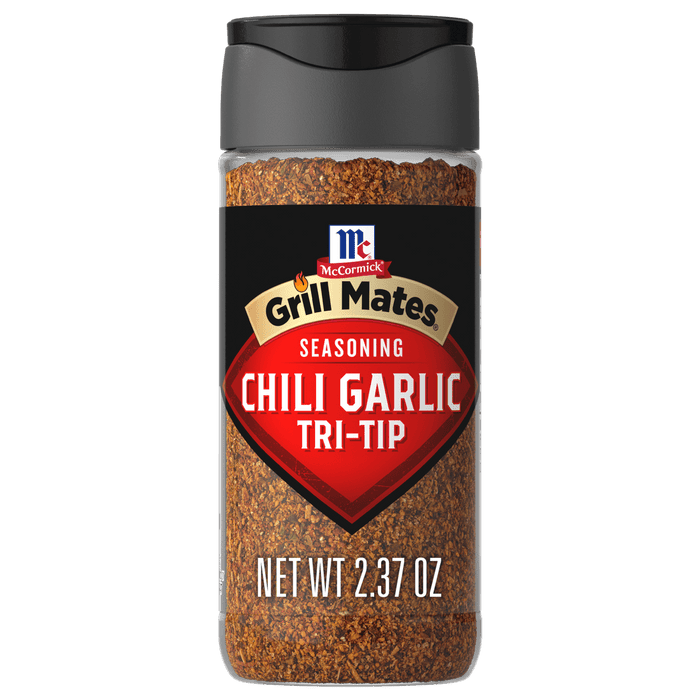 A bottle of McCormick Grill Mates Chili Garlic Tri-Tip seasoning.