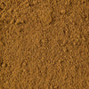 A close-up of a pile of brown, finely ground spice.