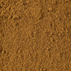 A close-up of a pile of brown, finely ground spice.