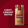 McCormick Roasted Ground Coriander is shown in a spice jar, highlighting its light, lemony notes.
