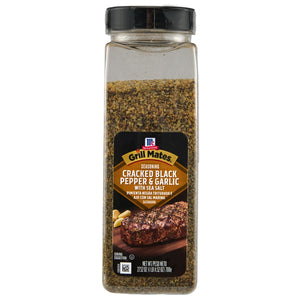 ['A bottle of McCormick Grill Mates Cracked Black Pepper &amp; Garlic seasoning.']
