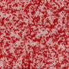 ['A close up of red and white sugar crystals.']